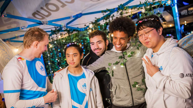 Esports analyst Barento "Raz" Mohammed (C) poses with (L-R) Jesper "Zven" Svenningsen, Kim "Berserker" Min-cheol, Ibrahim "Fudge" Allami and Jang "EMENES" Min-soo of Cloud9 at Faerie Court LCS after party during week 8 of the 2023 LCS Spring Split at the Riot Games Arena on March 16, 2023. (Photo by Colin Young-Wolff/Riot Games)